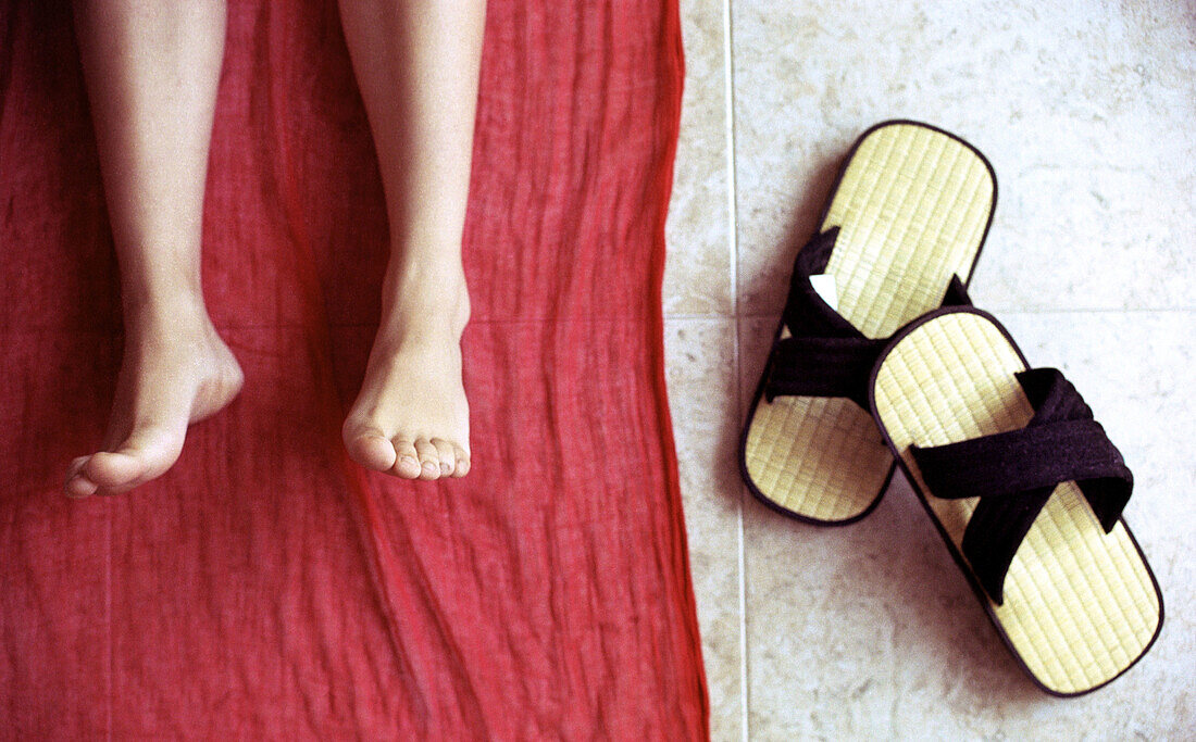 Feet and Japanese sandals.