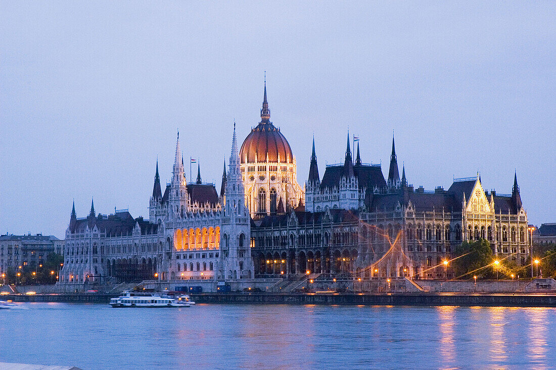 Parliament next to Danube River. Evening. Budapest, Hungary.