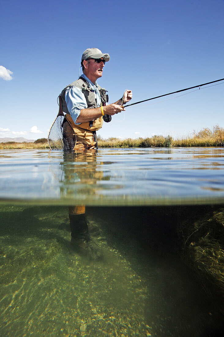 Man fly fishing. Silver Creek, Idaho. USA