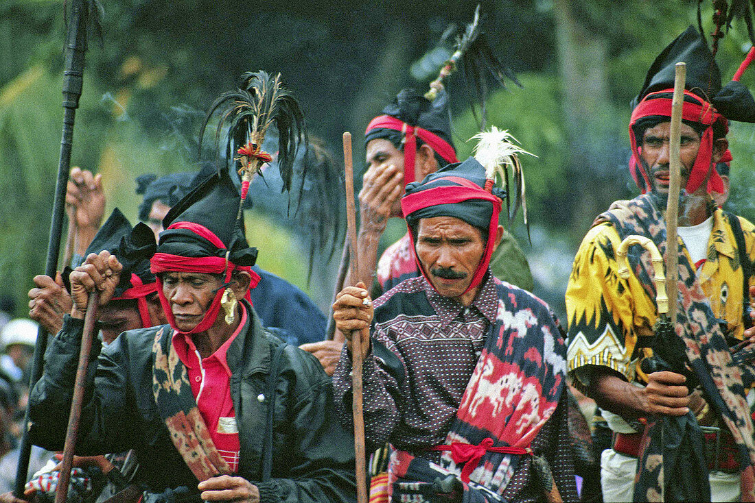 Sumbanese priests in traditional clothes. Sumba, Indonesia