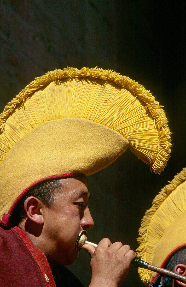 Monk play trumpet. Pangboche Gompa. Himalaya Region. Nepal