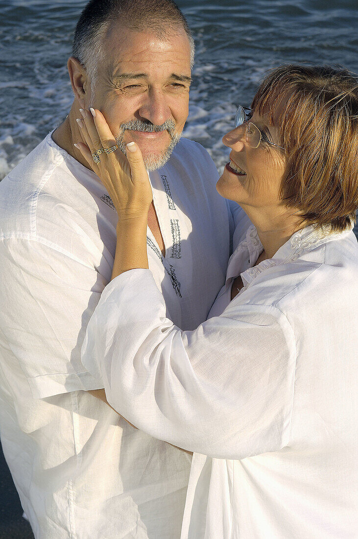 Middle-aged couple on the beach