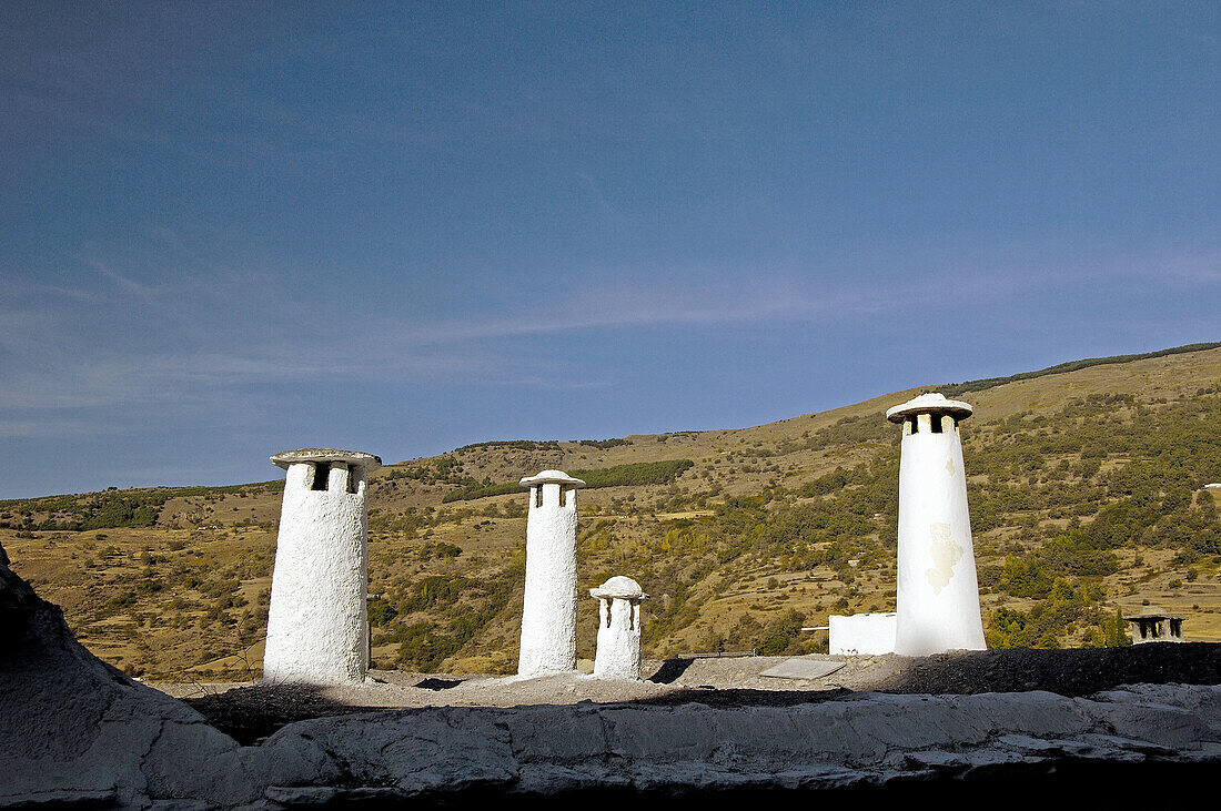 Typical roof with chimneys. Capileira, Alpujarras. Granada province, Andalusia, Spain