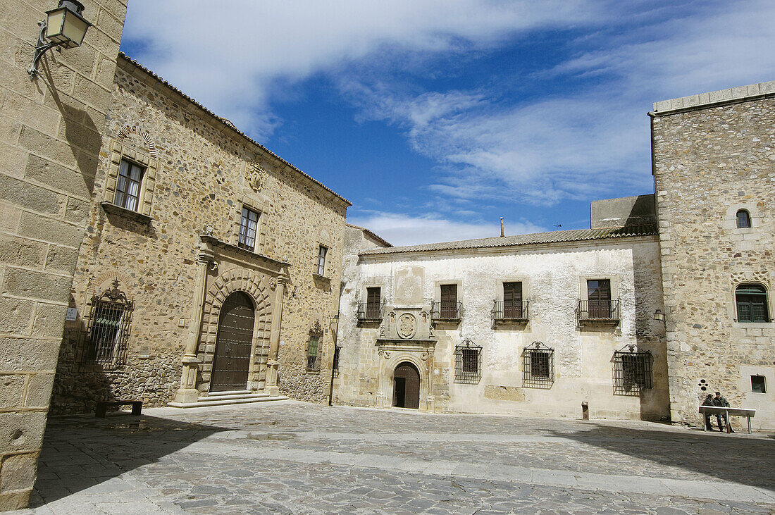 Episcopal Palace (left, 13th-18th century) and Palacio de Ovando (right, 16th century) in St. Marys Square, Cáceres. Extremadura, Spain