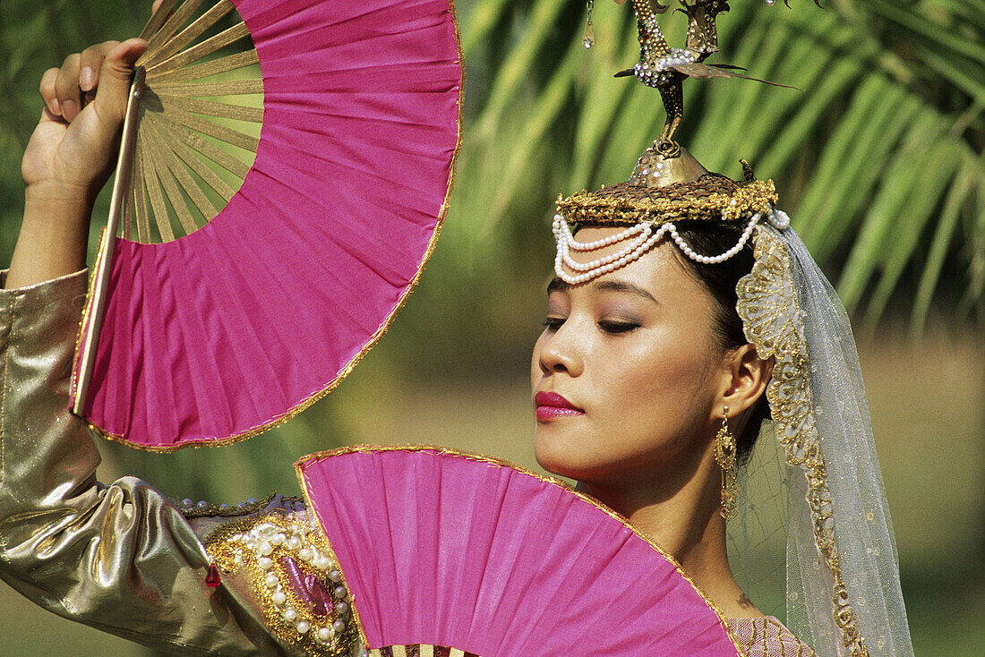 Princess waving fan. Philippines