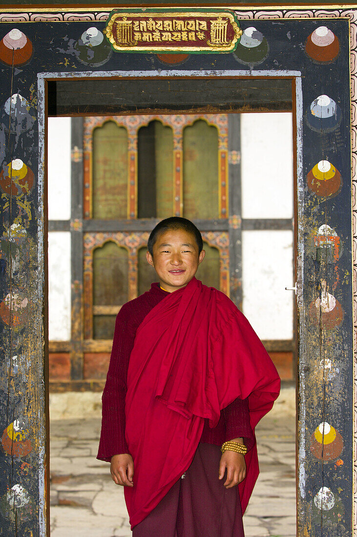 Novice monk at Tamshing Monastery, Tamshing village, Bumthang Village, Bhutan