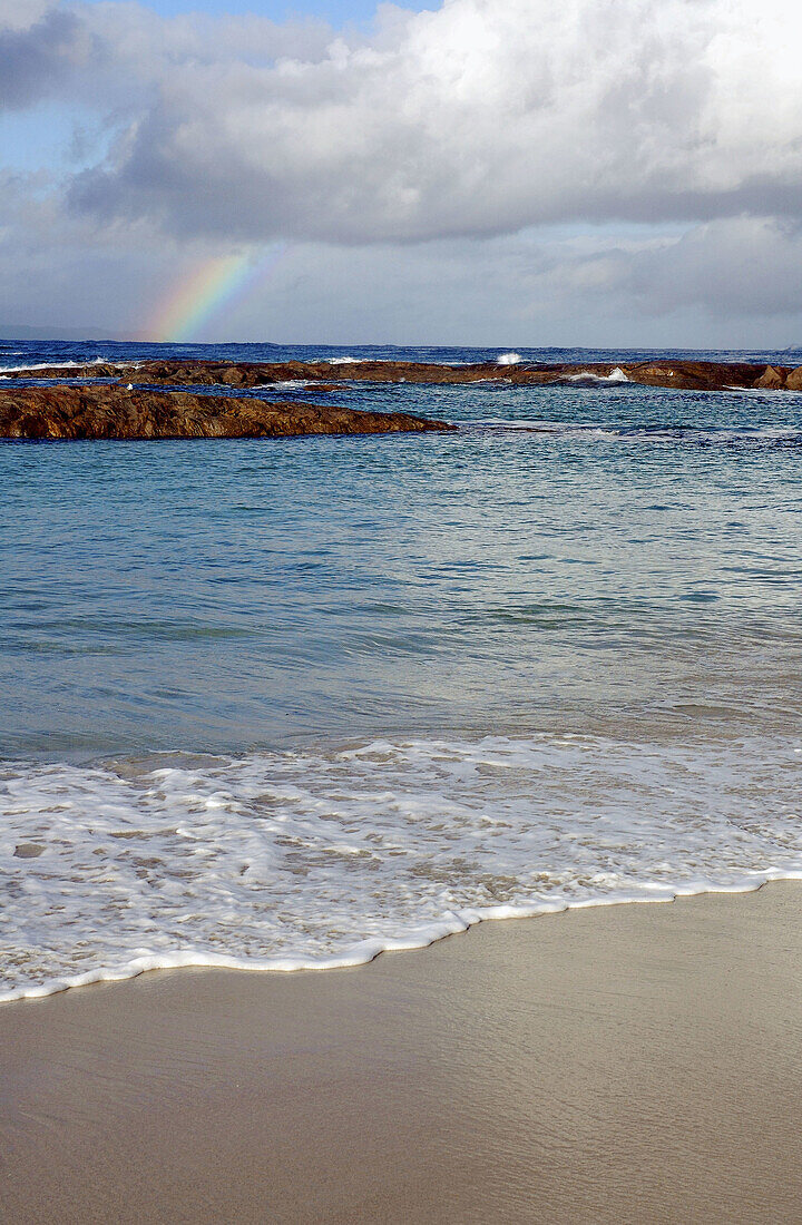 Rainbow over the sea. Peaceful Bay, Western Australia
