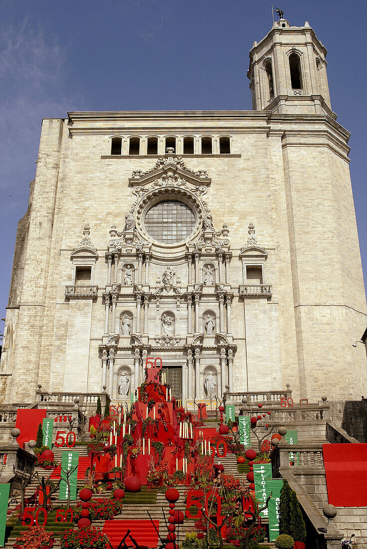 Façade of the cathedral during Temps de flors yearly international flower exhibition, Girona. Catalonia, Spain