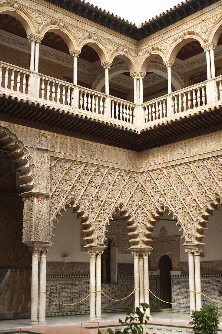 Central courtyard of mudejar palace, Reales Alcázares of Sevilla. Andalusia, Spain