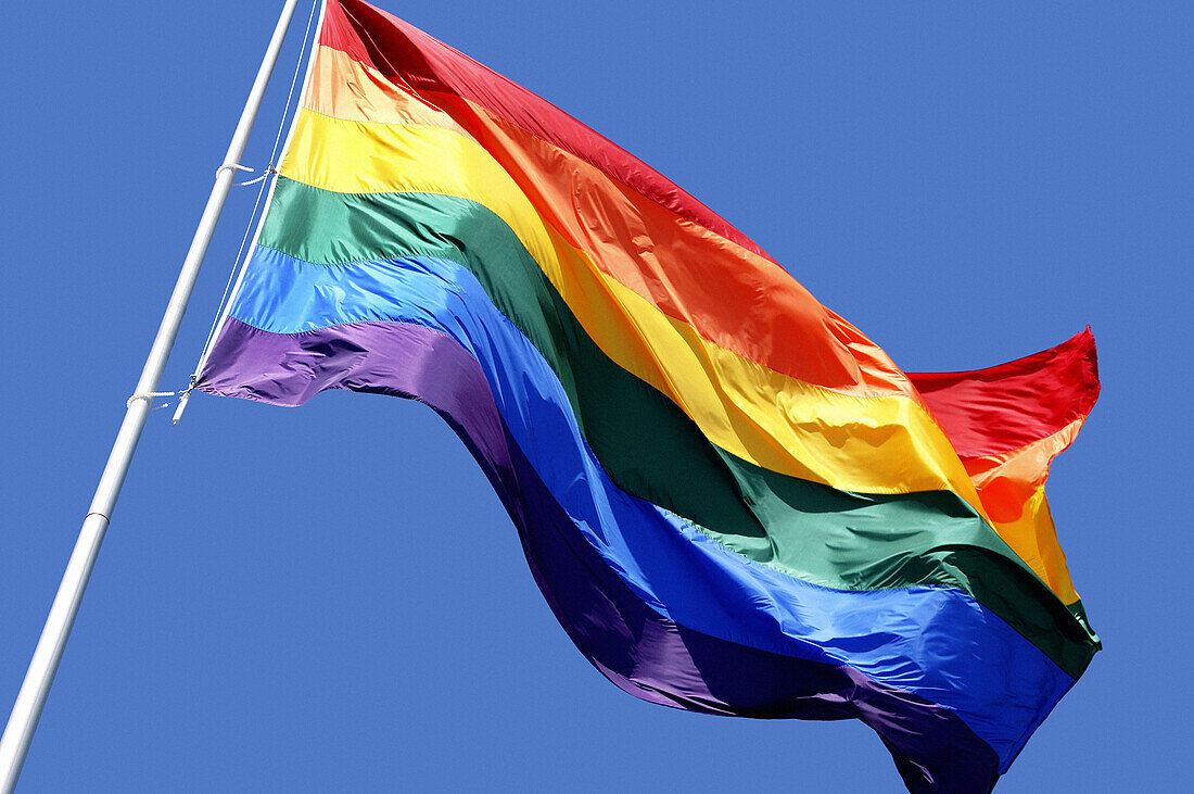 Rainbow flag waving over Castro District in San Francisco. California, USA