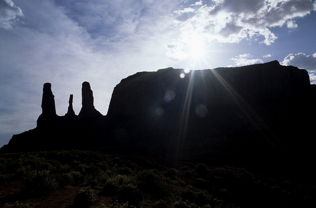 Three Sisters, Monument Valley, Circle Trail in late afternoon. Arizona, USA