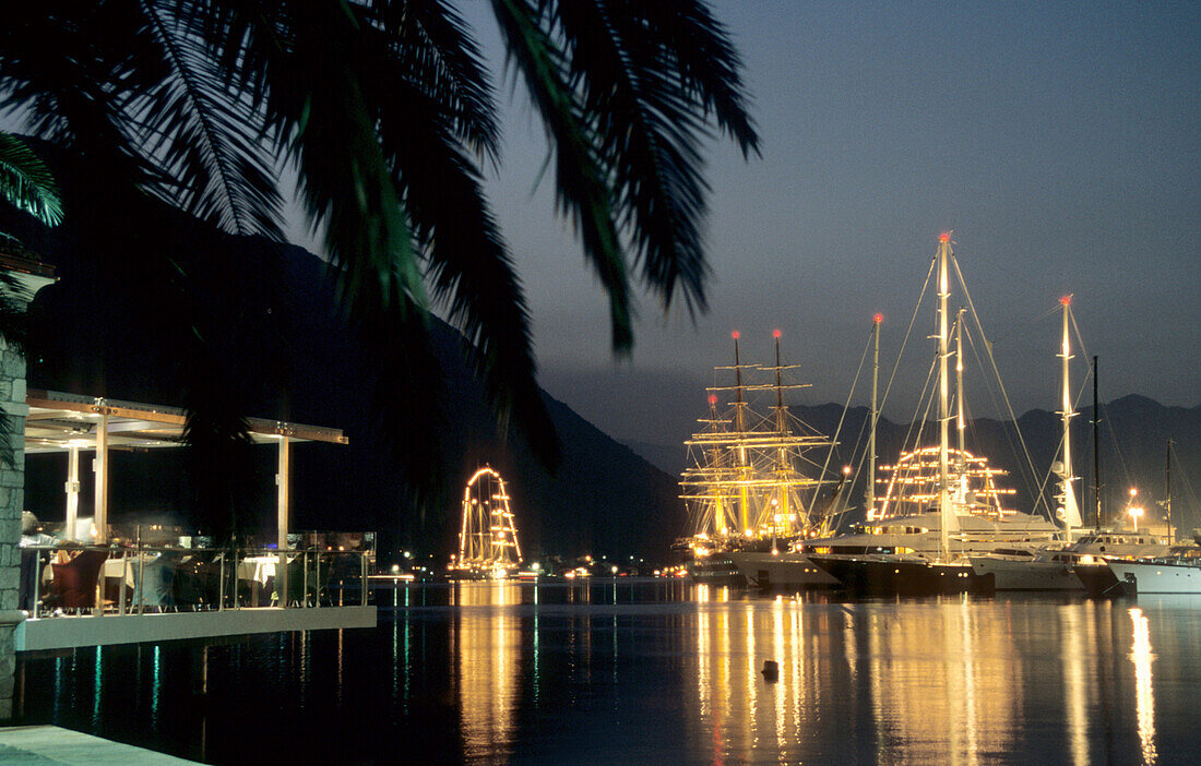 At night, sailing boats in the bay of Kotor, Montenegro