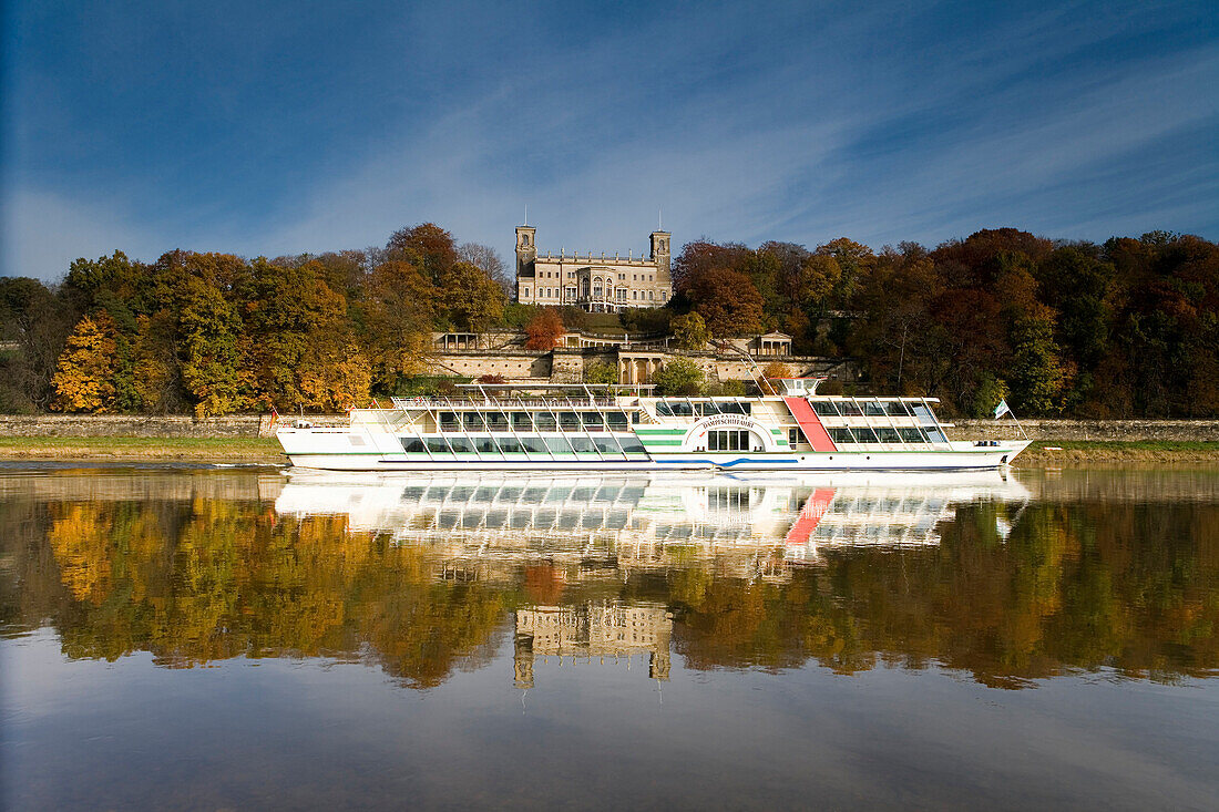 View over river Elbe with excursion boat to Albrechtsberg castle, Dresden, Saxony, Germany