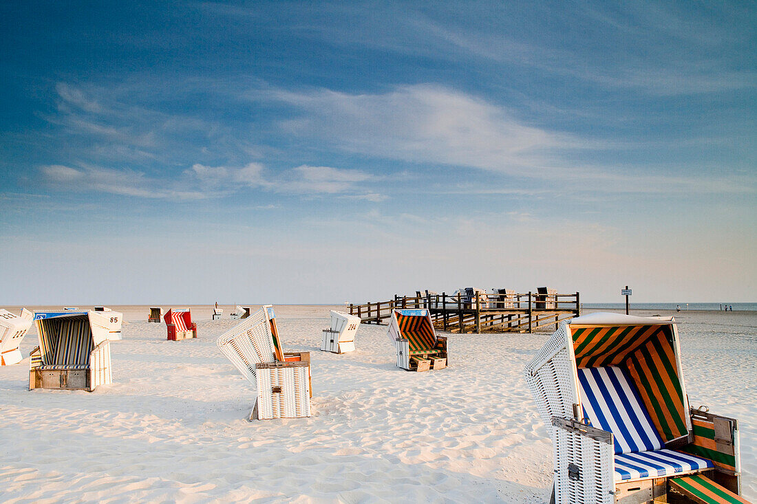 Beach chairs at beach, St. Peter-Ording, Schleswig-Holstein, Germany