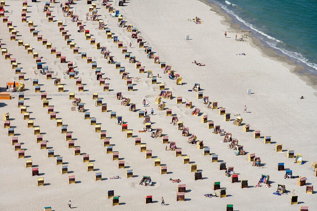 Beach chairs at sandy beach, Travemunde, Lubeck, Schleswig-Holstein, Germany