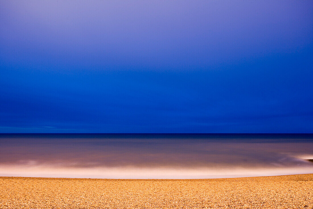 Beach in evening light, Brighton, East Sussex, England, Europe