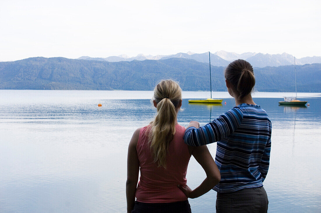 Two young women at Lake Walchensee, Upper Bavaria, Bavaria, Germany