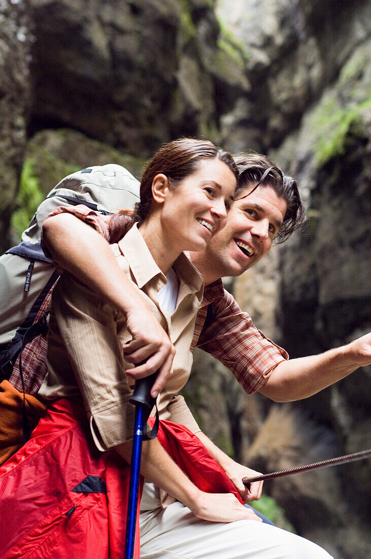 Couple hiking in gorge, Garmisch Partenkirchen, Bavaria, Germany