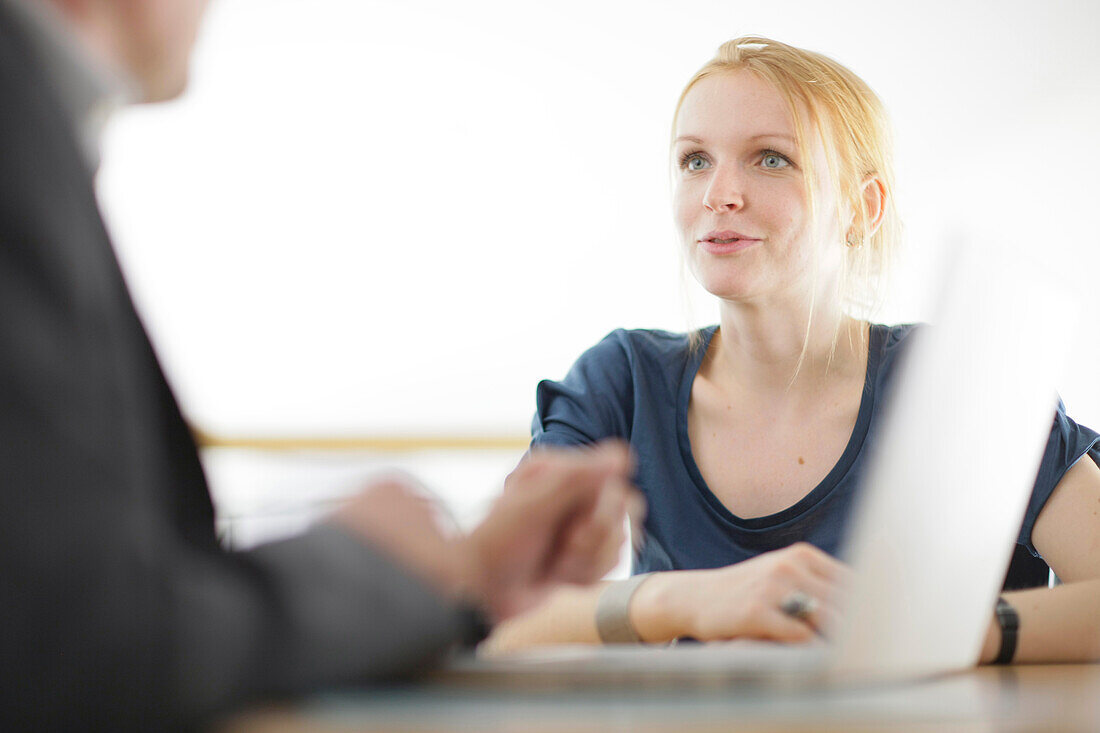 Female student in conversation, Laptop, University, Education