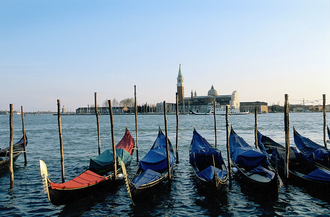 Gondolas and San Giorgio Maggiore island in background, Venice, Italy