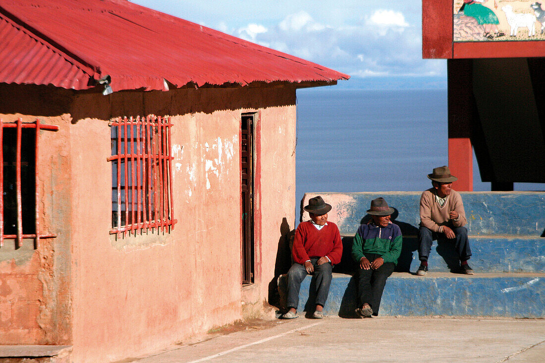 Men on Isla Amantani, Lake Titicaca, Peru