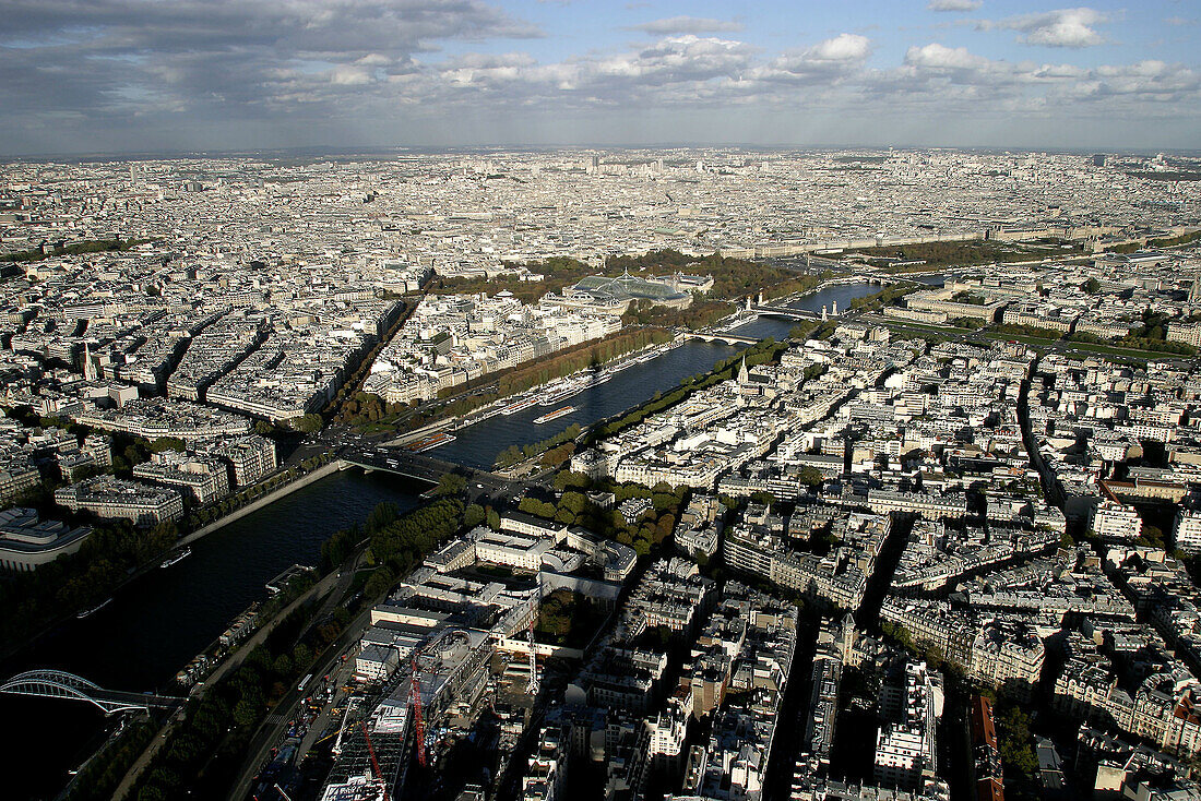 The aerial view of city of Paris with the shadow of Eiffel Tower in foreground, Paris, France