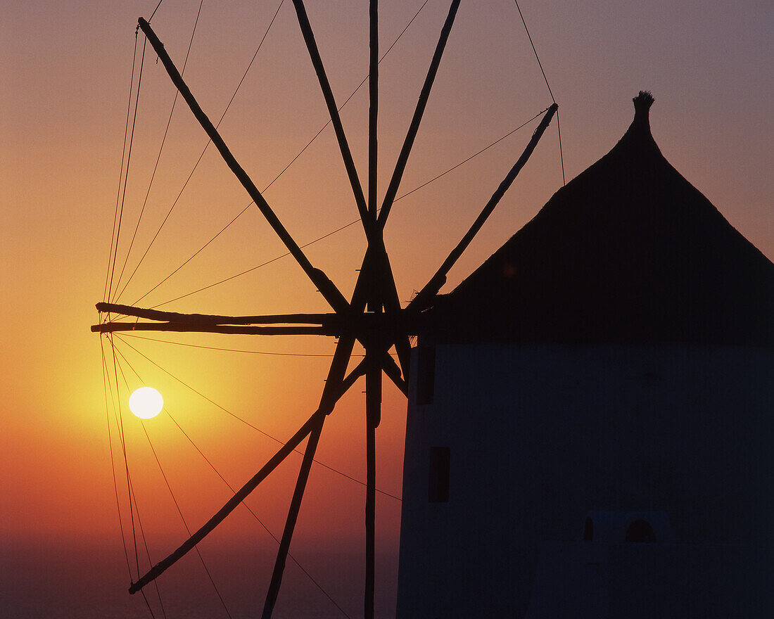 windmill, sunset, Oia city, Santorini island, Cyclades, Greece