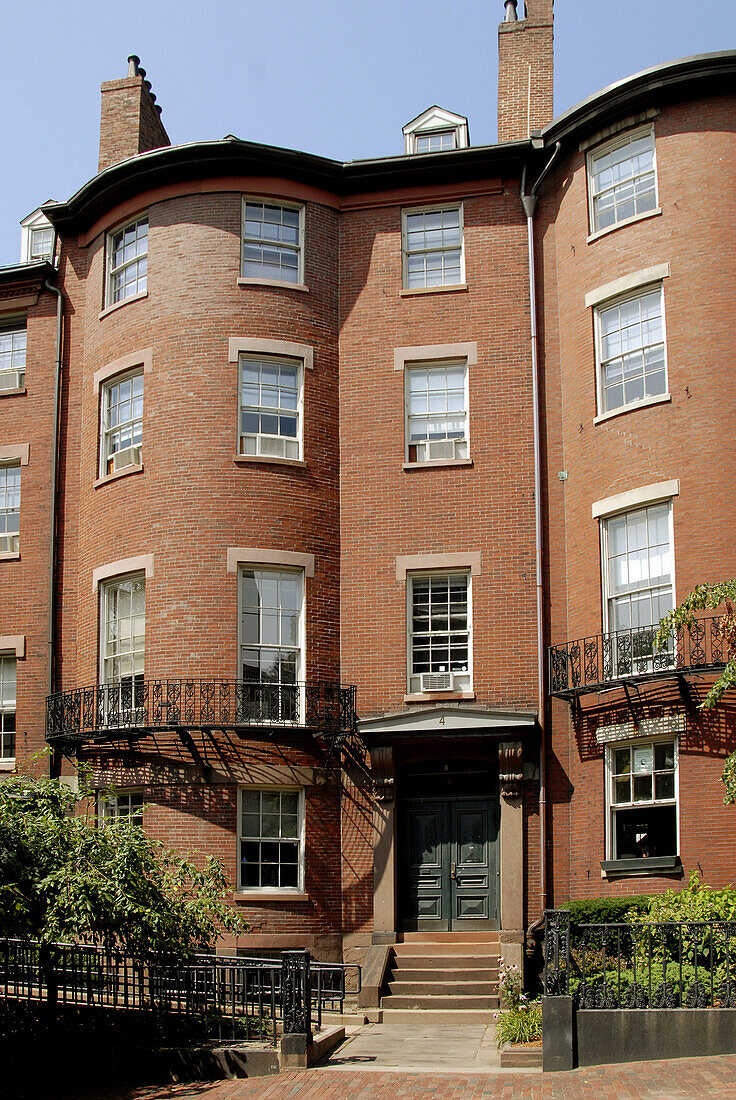 Historic rounded townhouse in the Beacon Hill section of Boston, MA. USA.