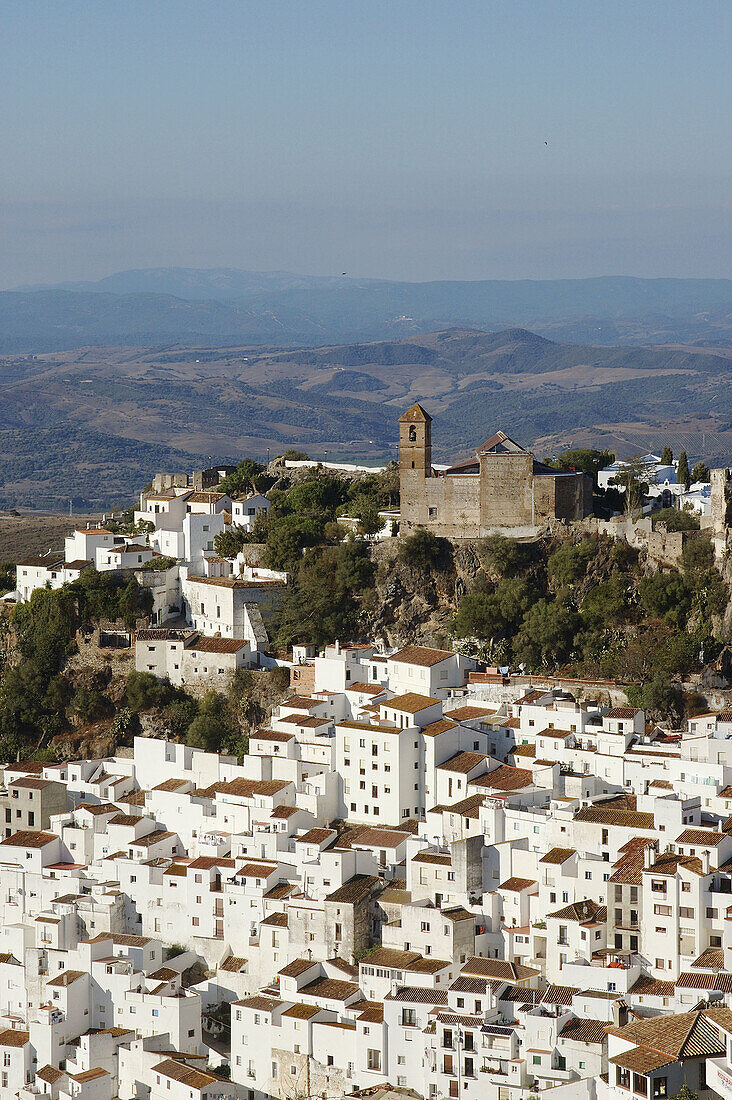 The church on top of the hill is Iglesia de la Encarnacion.Casares is a beautiful tipical white village near Costa del Sol.It seem like a treasure shinning under the strong Andalucian sun.