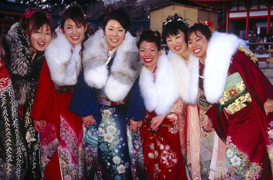 A group of Japanese girls wearing traditional kimono celebrating a coming of age ceremony at Heian-jingu. Kyoto city. Kyoto. Japan.
