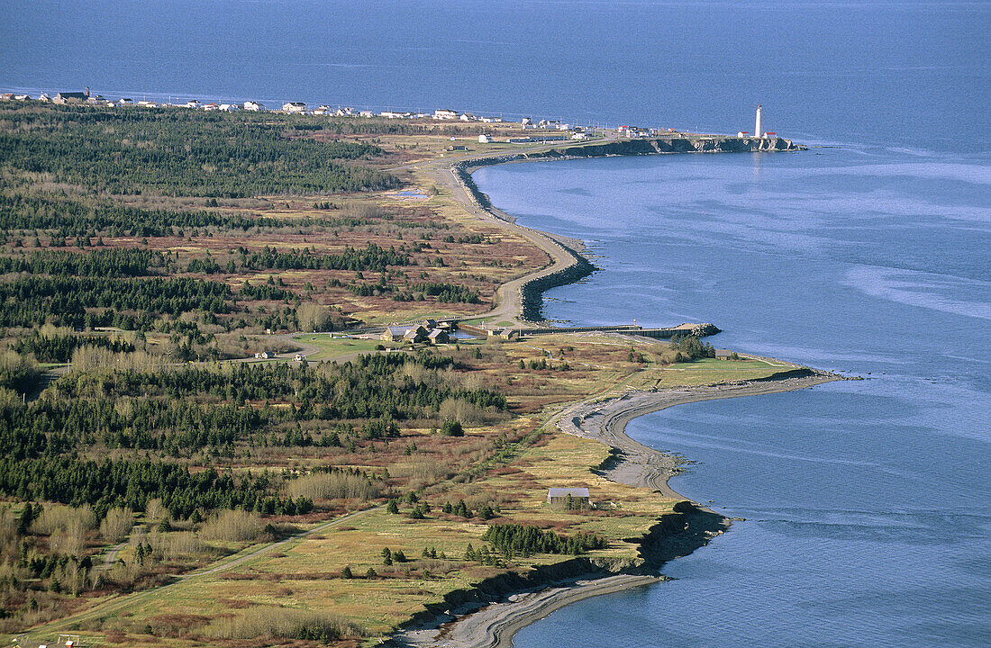 Coastline and lighthouse at Cap des Rosiers, Gaspesie, Quebec, Canada