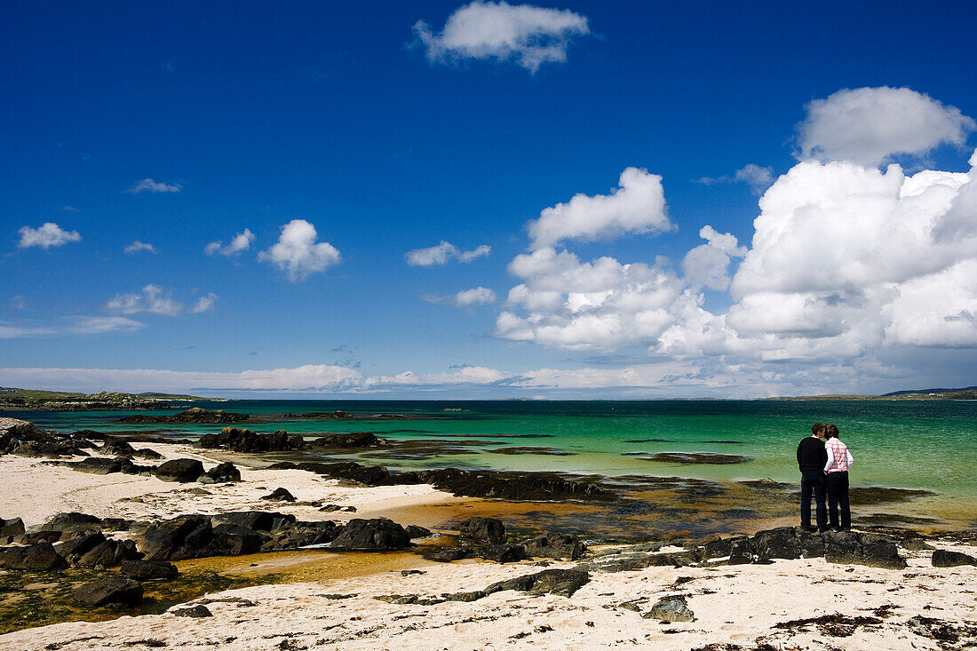Couple on the beach at Connemara, County Galway, Ireland, Europe