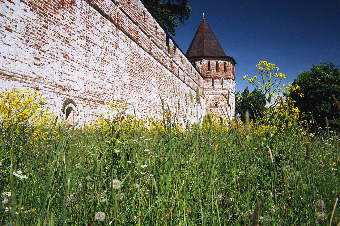 Red brick wall and tower of Borisogleb monastery, XVIIth century. Borisogleb. Yaroslavl region. Russia.