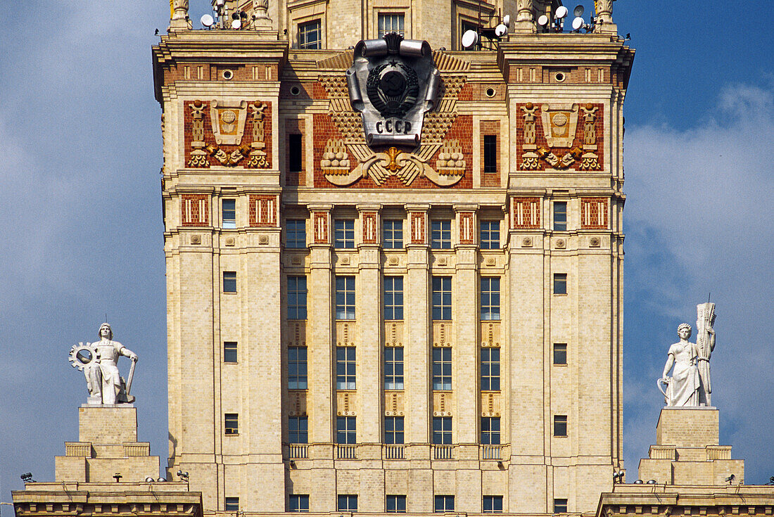 Stalin-era building of Moscow state university with statues, Moscow, Russia