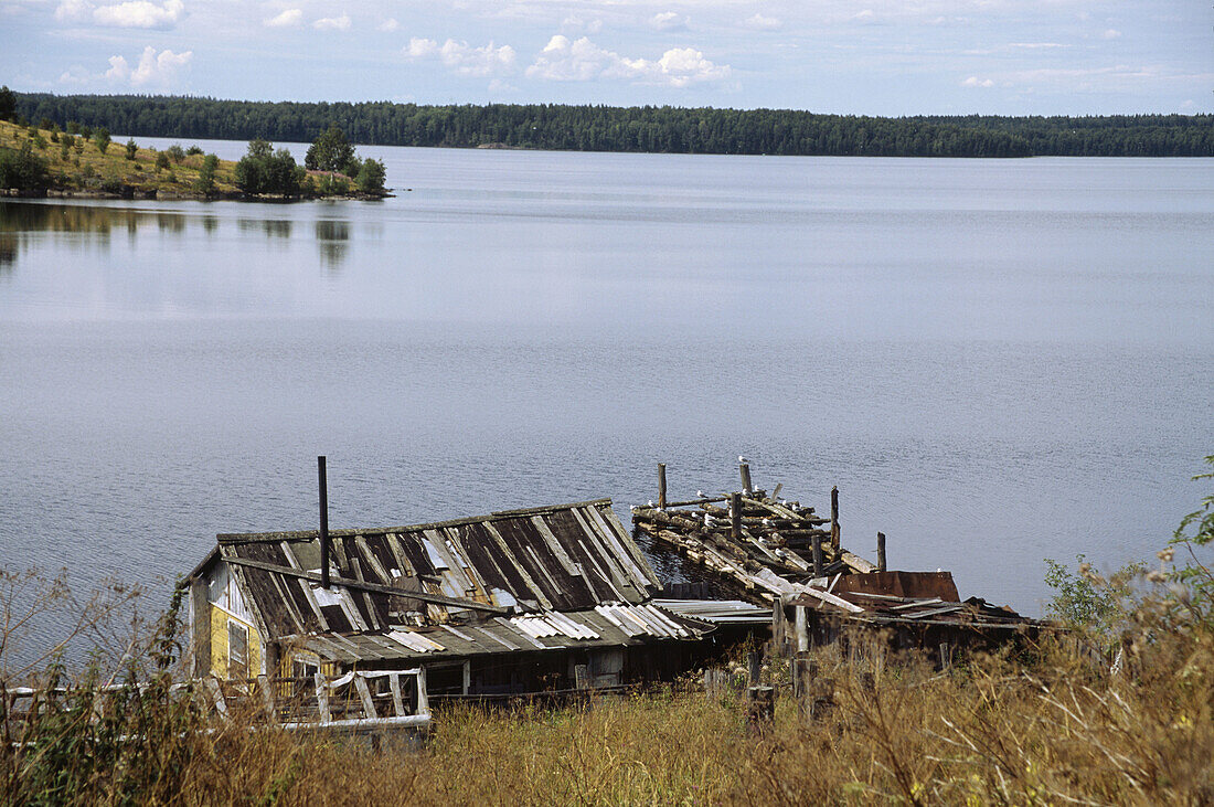 Barn and old pier on the Onega lake, Russia