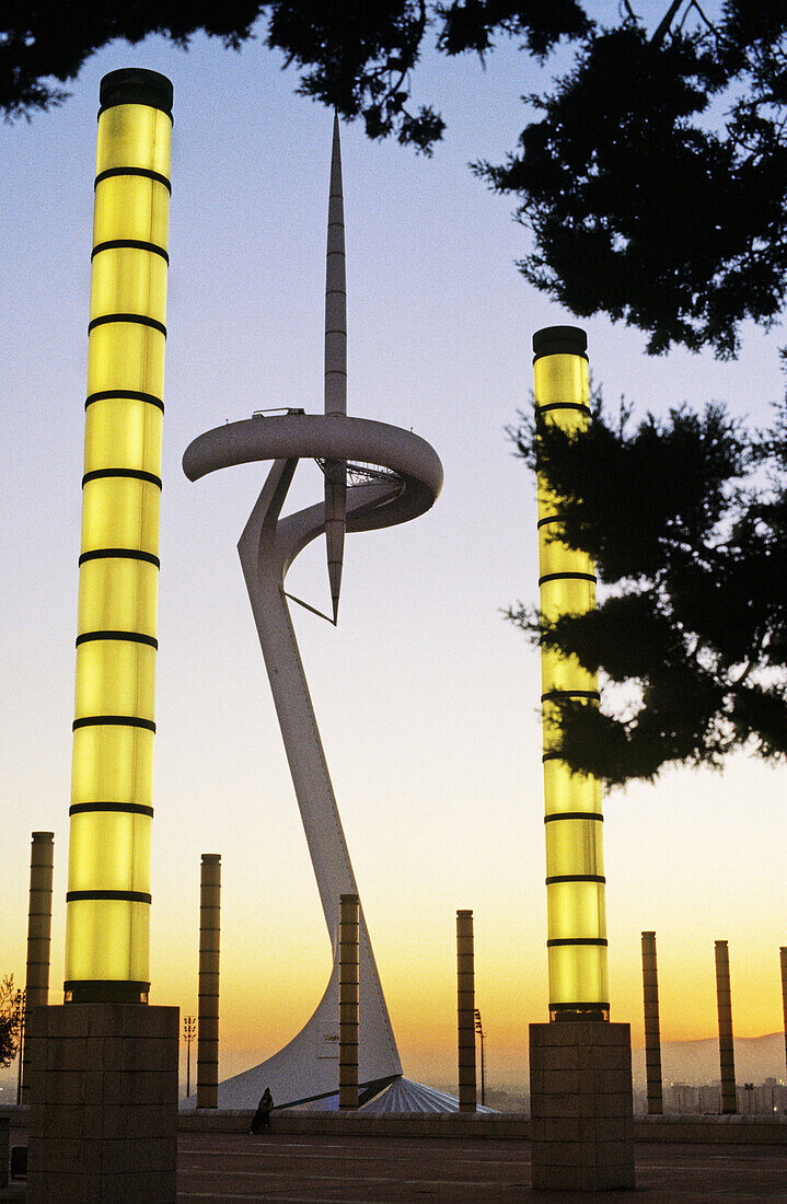 120 m. high telecommunications tower (1991) by Santiago Calatrava and street lamps in the afternoon, Anella Olímpica. Barcelona. Catalonia, Spain