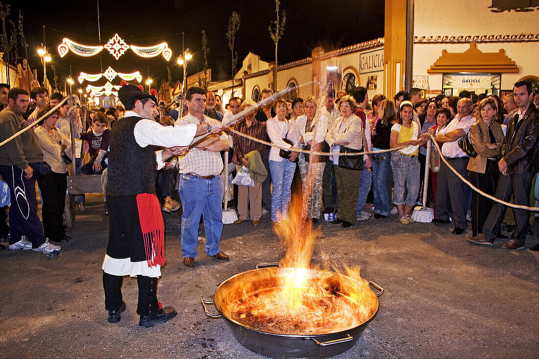 Preparing queimada (Galician traditional hot alcoholic drink) during folk festival in Fuengirola. Málaga province, Costa del Sol. Andalusia, Spain