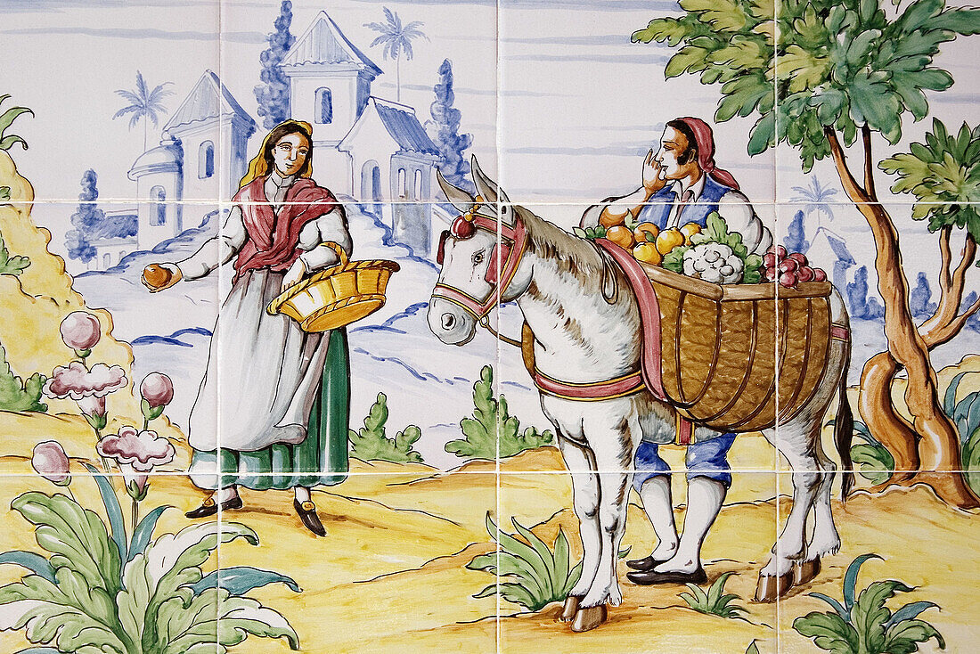 Mosaic of tiles depicting folk scenes in a cortijo (typical Andalusian farmhouse). Andalusia, Spain