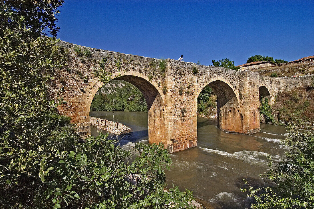 Roman bridge over Ebro river in Pesquera de Ebro. Burgos province, Castilla-León. Spain