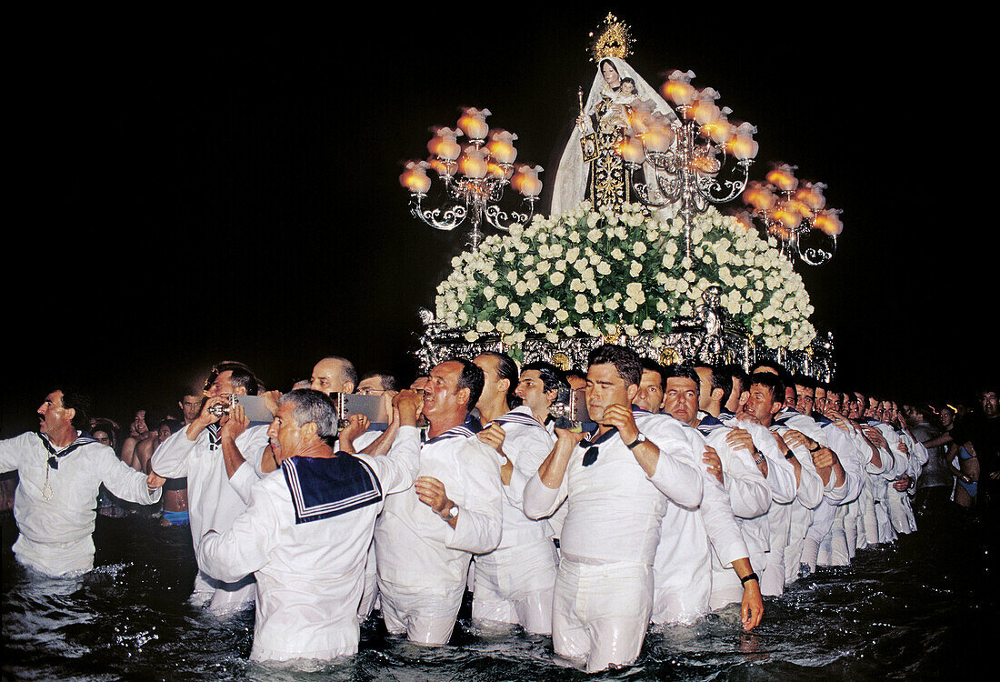 Procession of Virgen del Carmen in the sea at Fuengirola, on the Costa del Sol. Málaga. Andalucia. Spain.