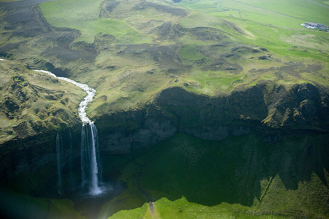 Skogafoss fall from a small airplane. Iceland