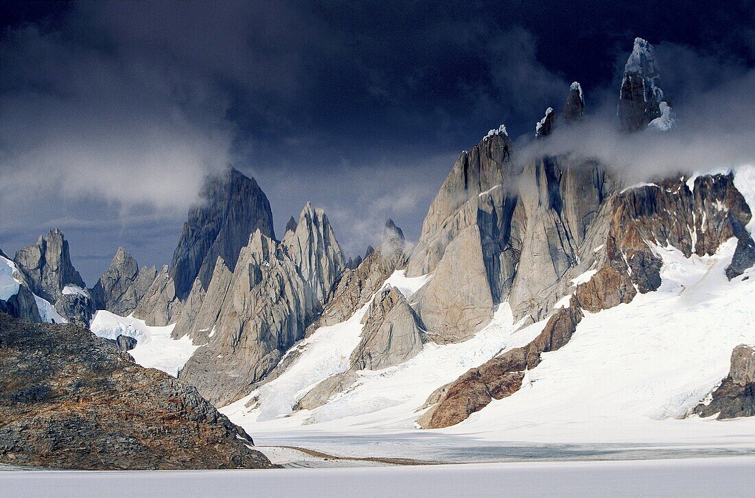 South America, Argentina, Patagonia Parque Nacional los Glaciares Clouds over Cerro Torre and Cerro Fitz Roy