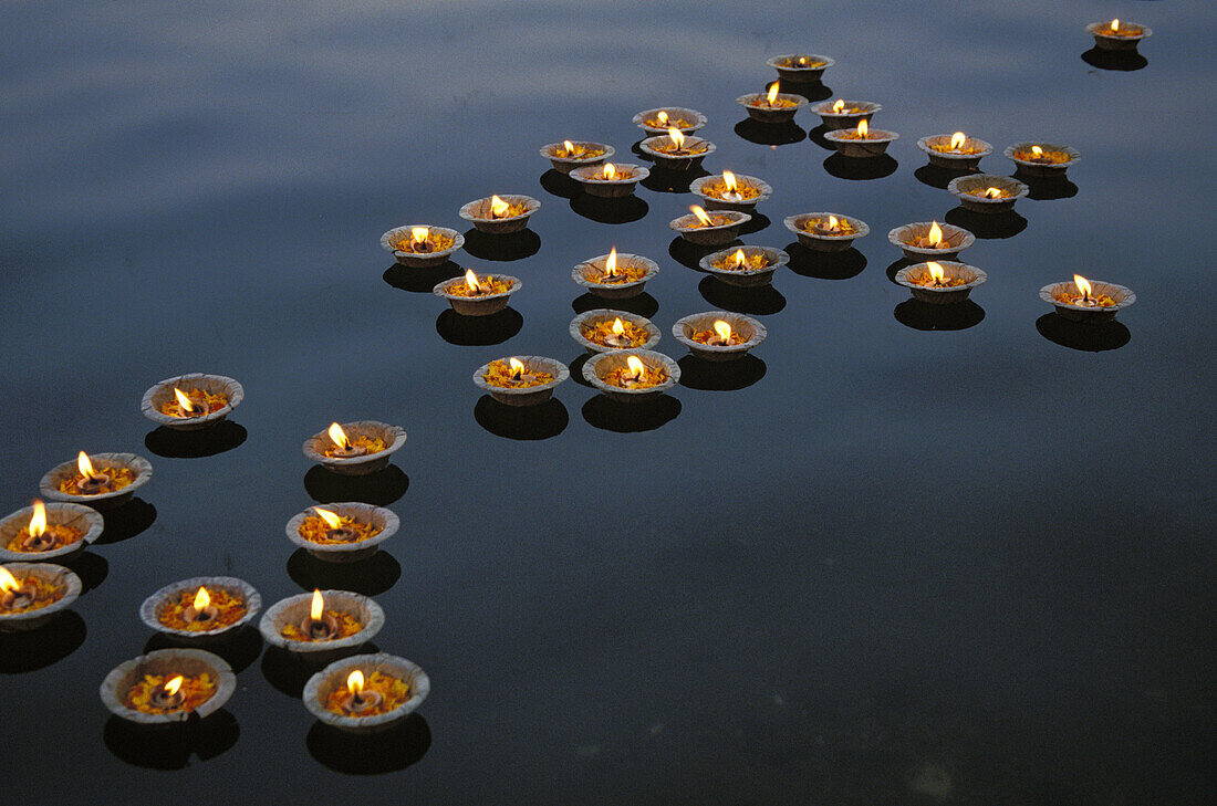 Floating Candles on the Gange River as offerings to the Water god
