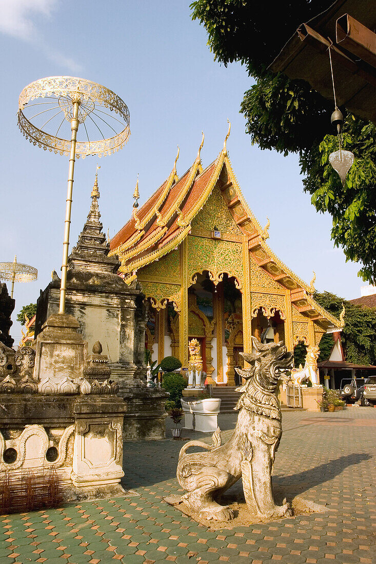 The large wiharn (prayer hall) with an intricately carved front in the  Wat Pra Sing Complex.