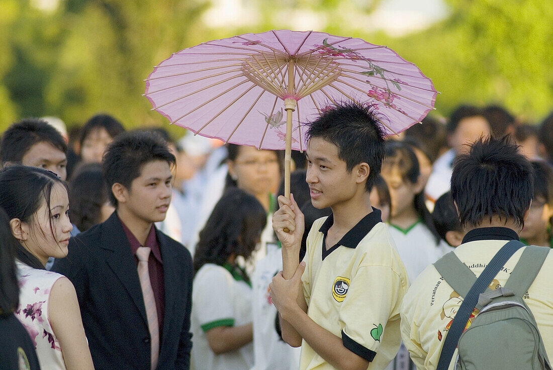 Shooting from the crowd during Wesak Day Festival in Kuching, Sarawak, Malaysia.