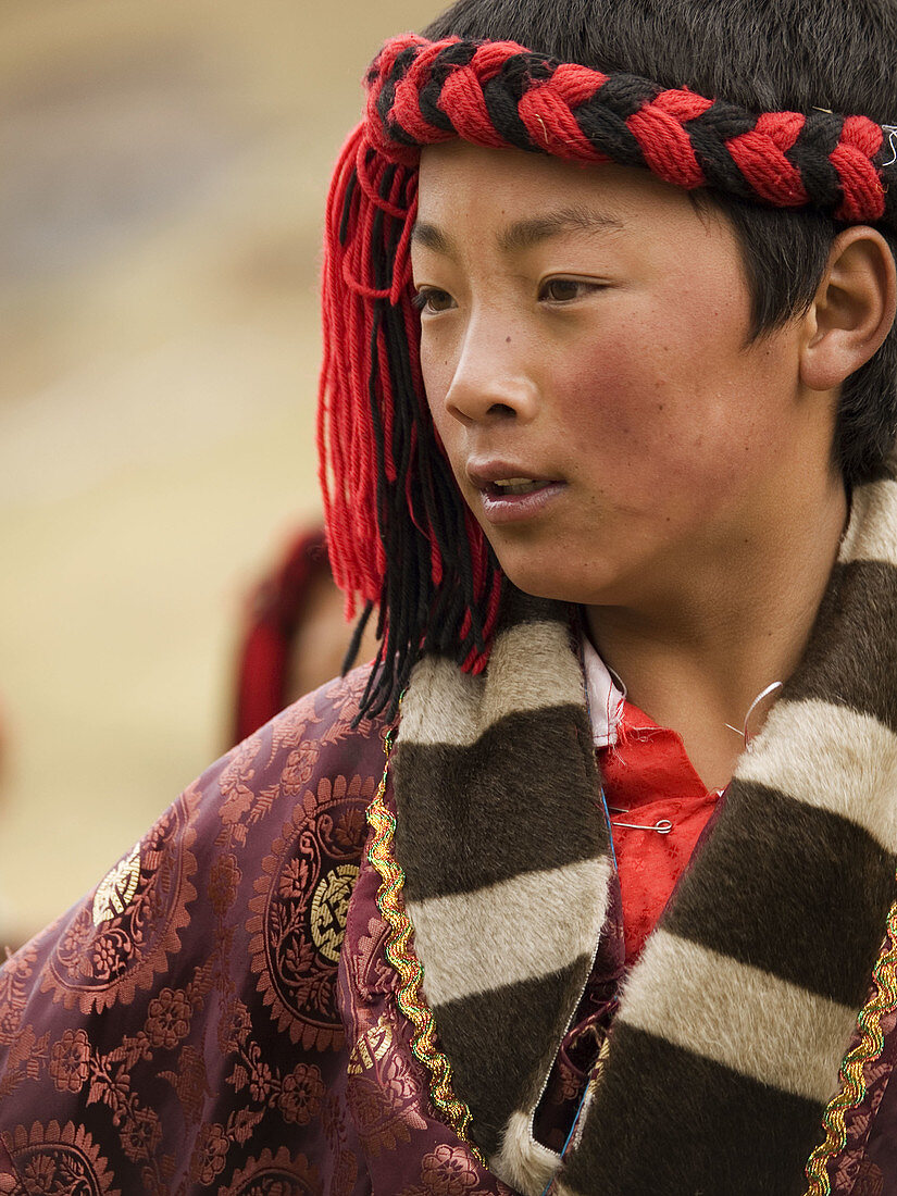 Traditional young tibetan dancer in Kham. Tibet.