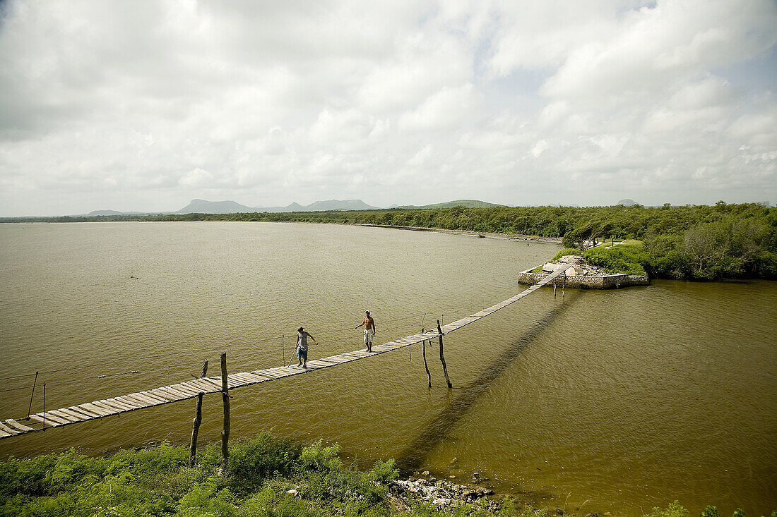 Suspension bridge in the mouth of river Cacoyugüin. Gibara. Holguín. Cuba.