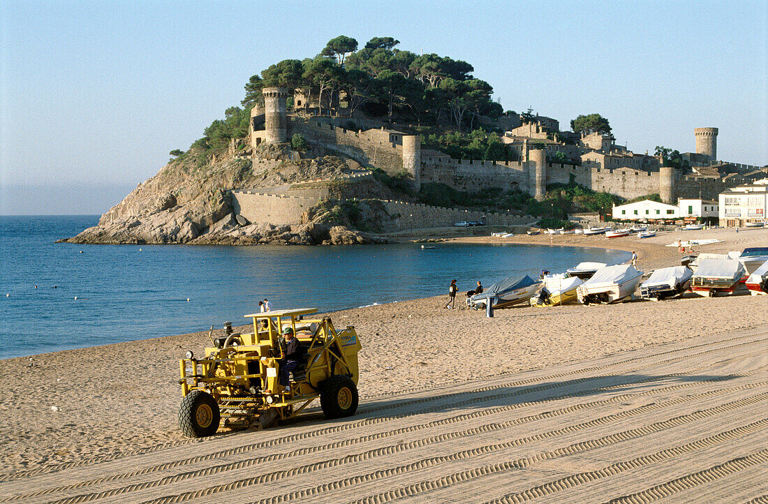 Cleaning the Beach. Tossa de Mar, Costa Brava, Girona province, Catalonia, Spain