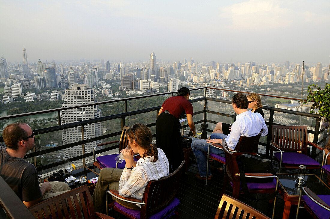 Evening drinks in the Moon Bar with stunning views from Sukhothai Hotel, Bangkok, Thailand
