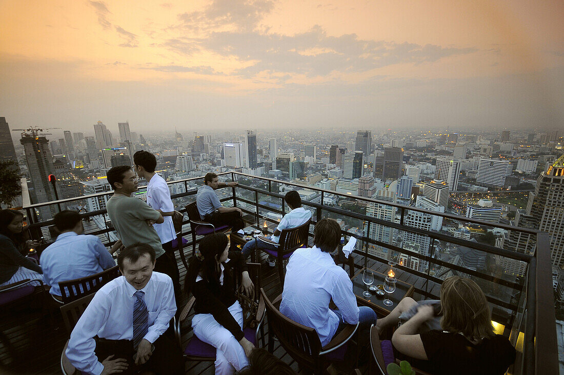 Evenings drinks in the Moon Bar with stunning views from Sukhothai Hotel, Bangkok, Thailand